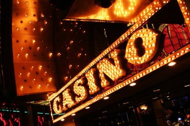 klik 365 Caribbean Stud Poker live table with dealer and player cards visible